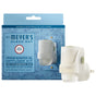 A Mrs. Meyer's Premium Scented Oil Diffuser Kit in Rain Water scent, featuring the device and packaging in blue and white, provides garden-inspired fragrance with high-quality scented oils.
