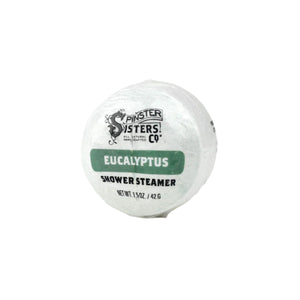 The 1.5 oz (42 g), round, white Eucalyptus Shower Steamer by Spinster Sisters Co. offers invigorating aromatherapeutic scents with essential oils, showcased against a plain white background.