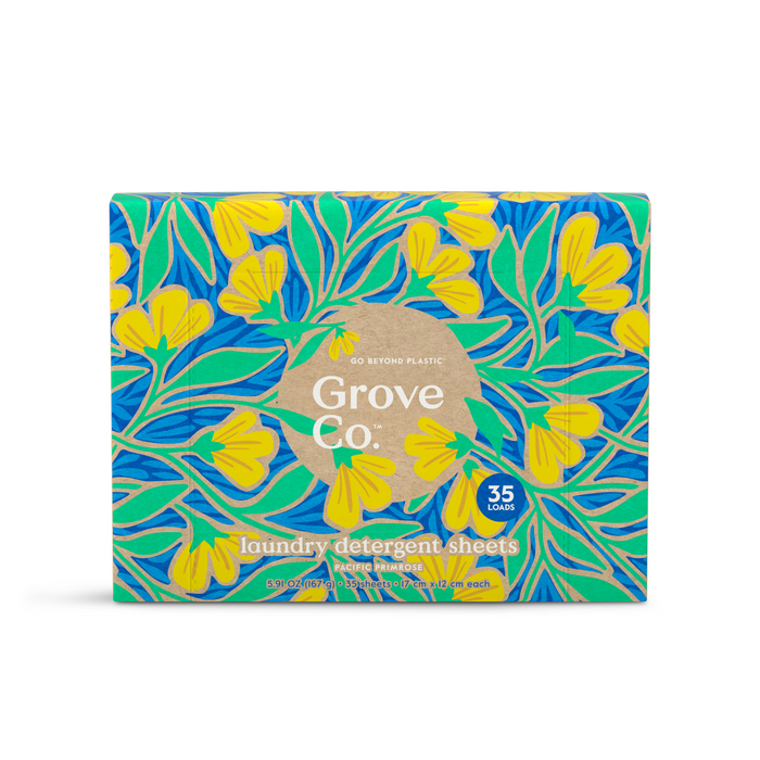 Grove Co.s limited edition Laundry Sheets - Spring Collection features vibrant floral packaging with yellow flowers and green leaves on a blue background, highlighting 35 loads in a blue circle and emphasizing their commitment to fighting plastic pollution.
