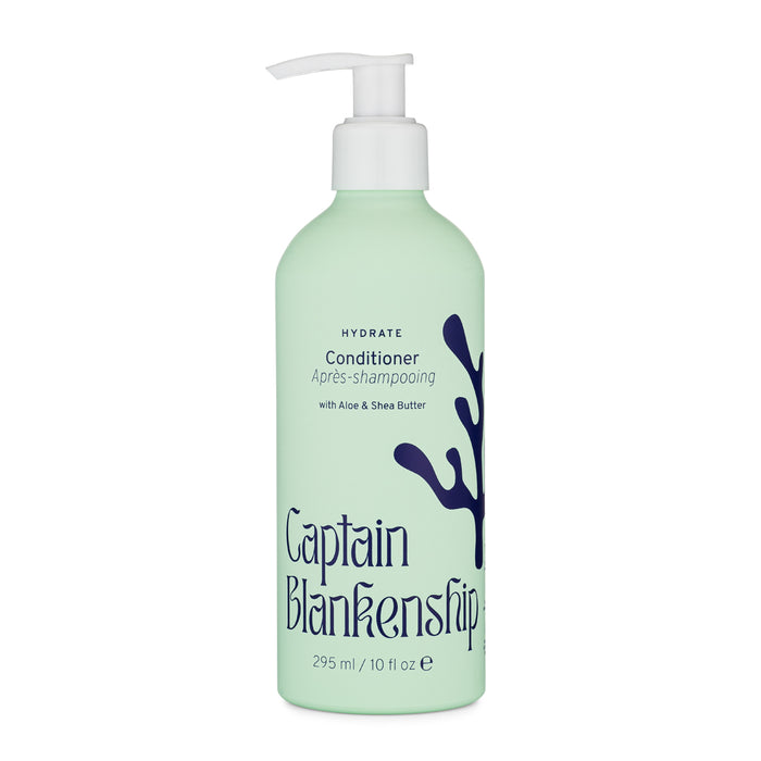 A light green bottle of Captain Blankenship Hydrate Conditioner with a white pump top, featuring dark blue coral graphics and text indicating it contains aloe and shea butter, 295 ml (10 fl oz).
