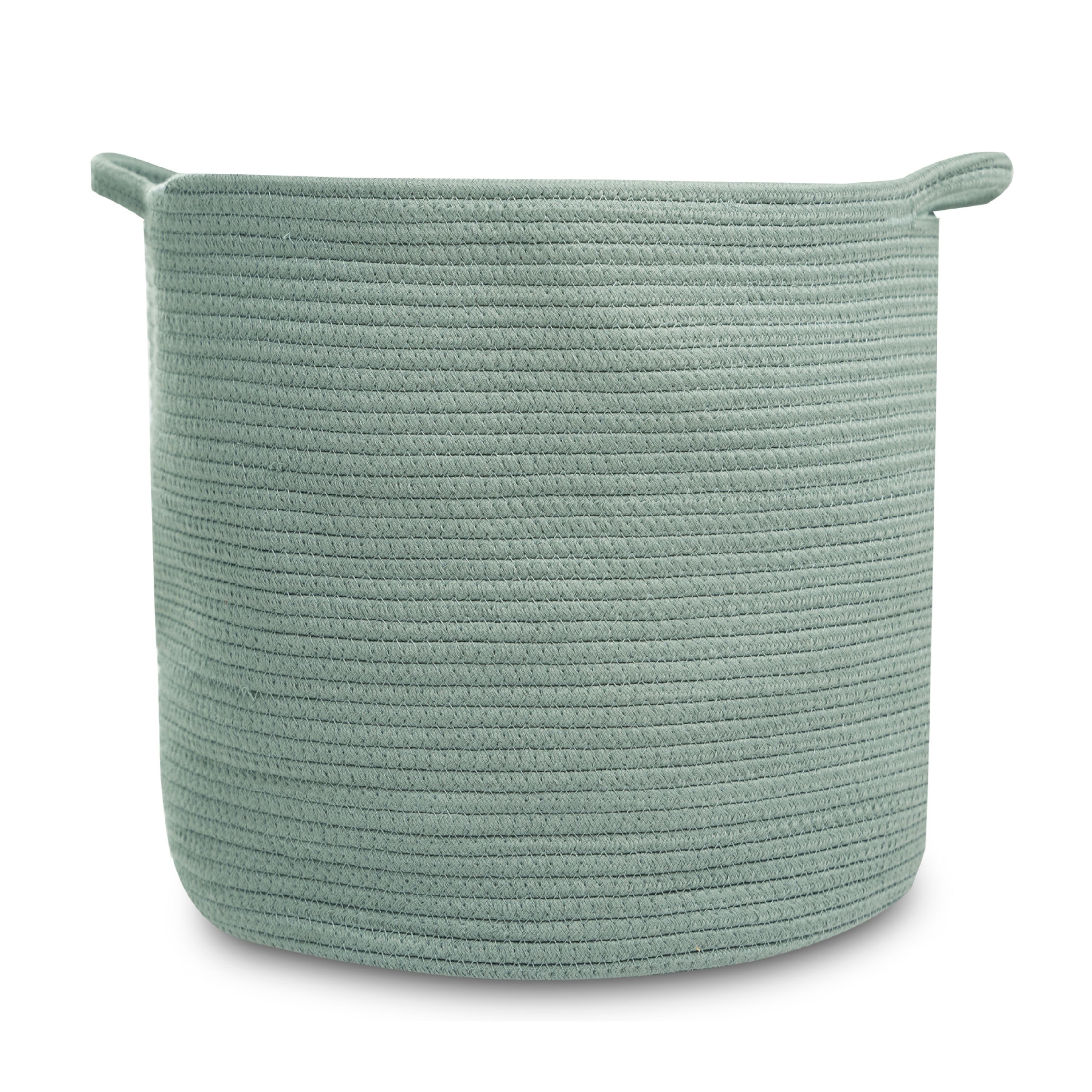 The Natemia Rope Storage Basket is mint green and round, made from organic cotton. Featuring two side handles, its textured rope-like design stands out against a white background, making it an ideal stylish nursery organizer.