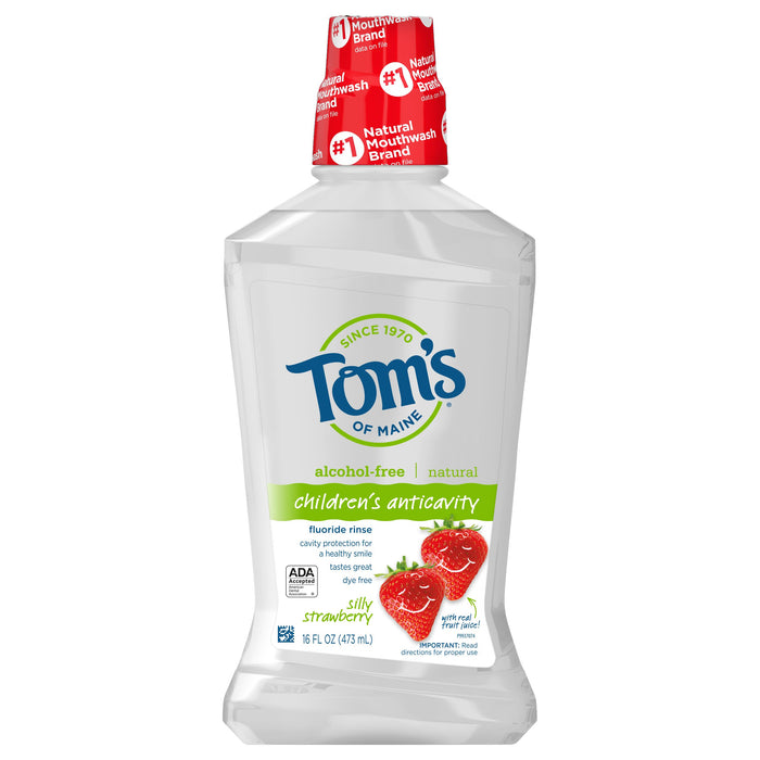 A bottle of Toms of Maine Childrens Anticavity mouthwash in Silly Strawberry flavor, featuring a white label with strawberries and green text, and a red cap. The bottle is 16 fl oz (473 mL) and alcohol-free.