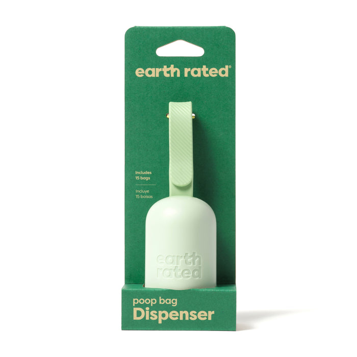 A green Earth Rated poop bag dispenser with a strap, packaged on a matching green cardboard backing. The packaging states it includes 15 bags and is labeled “poop bag Dispenser” in white text.