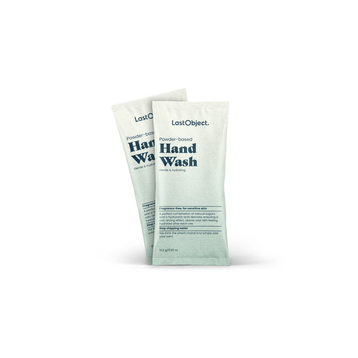 Two sachets labeled LastObject Powder-based Hand Wash with text indicating they contain gentle and hydrating hand wash powder, standing upright against a white background.