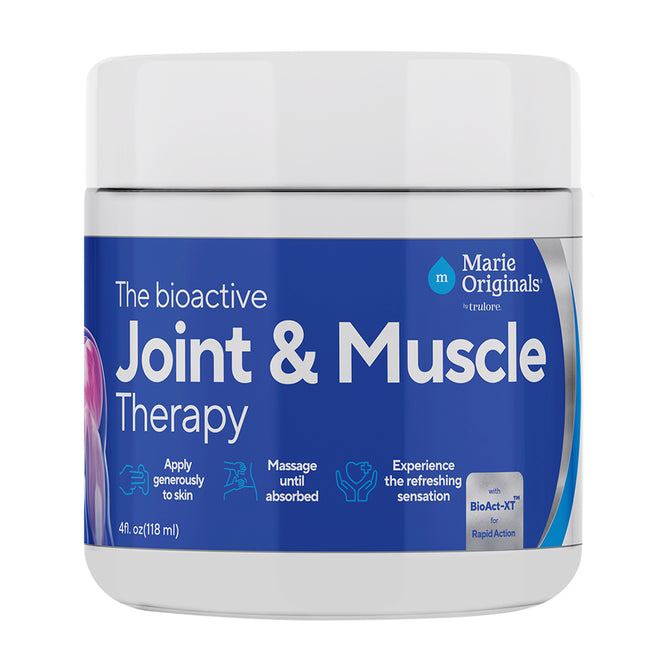 A white plastic jar of Marie Originals Joint & Muscle Cream with blue labeling displays product instructions and branding, highlighting its bioactive formula for joint discomfort and muscle tension relief.
