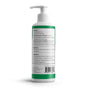 A white plastic pump bottle of Marie Originals Eczema Moisturizing Lotion with a green label is shown backward, displaying warnings, directions, and ingredients—detailed info ideal for sensitive skin.