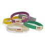 Five fabric wristbands in yellow, purple, gray, green, and beige, each with a small beige tag featuring two red dots, arranged overlapping on a white background.