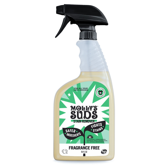 A spray bottle of Molly’s Suds Stain Remover, fragrance free, 16 fl oz. The label highlights safer ingredients, fights stains, and is suitable for all fabric types. The bottle is clear with a black spray nozzle.