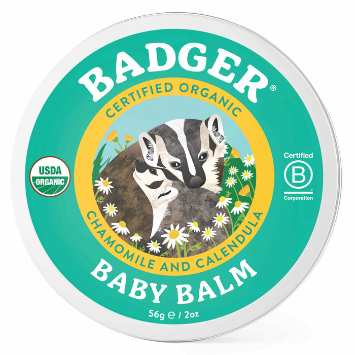 A round tin labeled BADGER BABY BALM features an illustration of a badger with a baby badger and flowers. The label highlights it is certified organic with chamomile and calendula, and displays USDA Organic and B Corp logos.