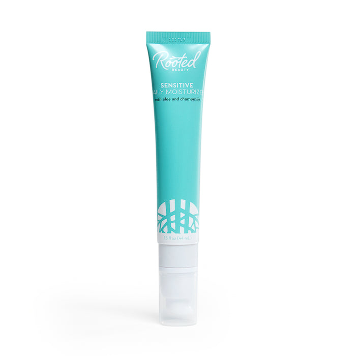 A turquoise tube of Rooted Beauty Sensitive Daily Moisturizer with aloe and chamomile, featuring a white cap and white logo and text on the front.
