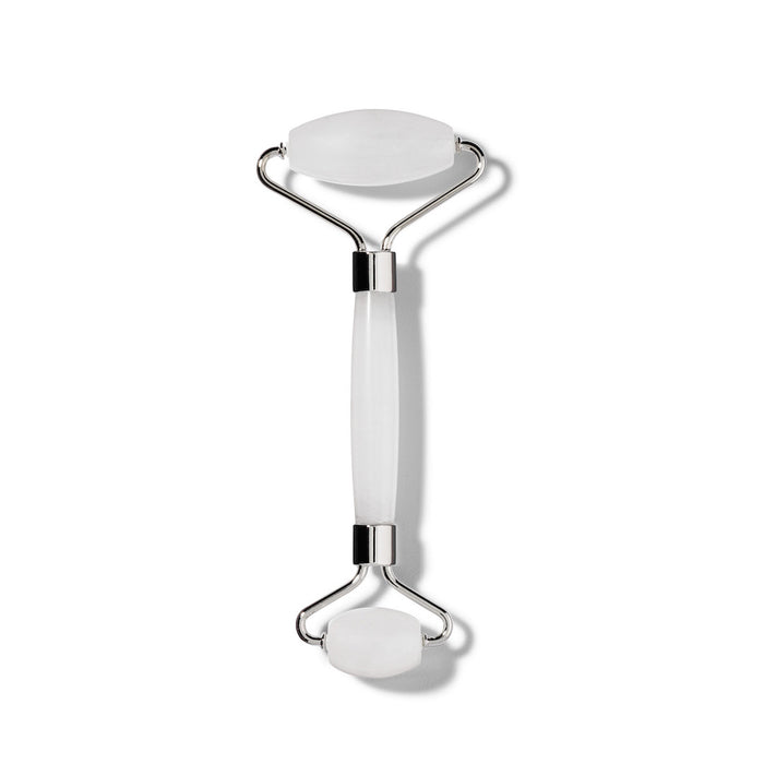 A white jade facial roller with silver metal accents, featuring one large and one small roller on each end, displayed on a white background.
