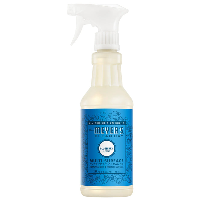 A 16 fl oz (473 mL) Mrs. Meyer's Multi-Surface Cleaner in blueberry scent with a white spray nozzle, blue label, and floral illustrations, made with essential oils.