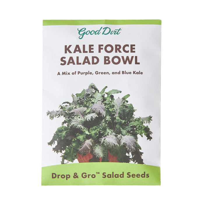 A packet labeled Good Dirt KALE FORCE SALAD BOWL with an image of leafy kale. The packet says, A mix of purple, green, and blue kale and Drop & Gro Salad Seeds.