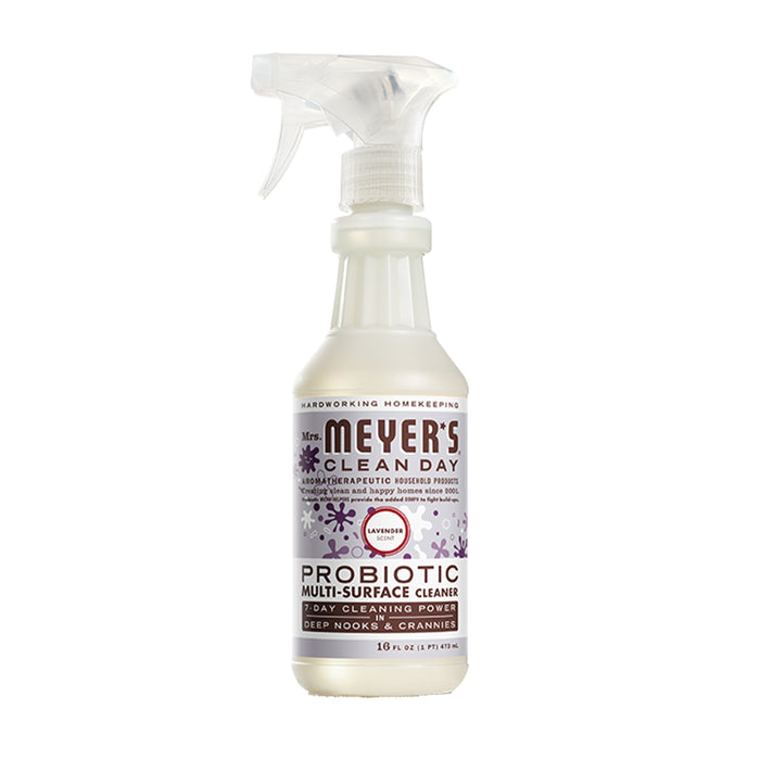 A spray bottle of Mrs. Meyer’s Clean Day Probiotic Multi-Surface Cleaner in lavender scent, featuring a white label with purple accents and a clear plastic trigger sprayer. The bottle size is 16 oz.
