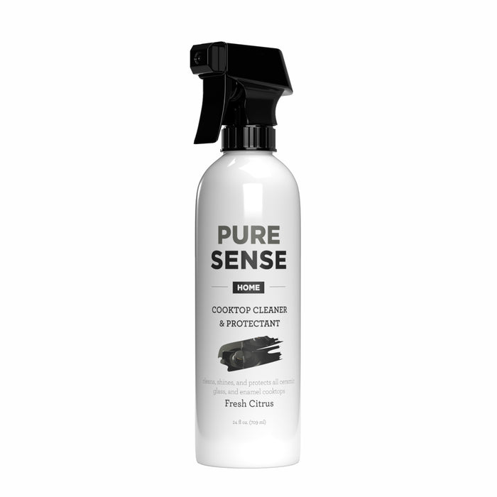 A white spray bottle labeled Pure Sense Home Cooktop Cleaner & Protectant with a black nozzle. The label mentions fresh citrus scent and is designed for cleaning glass and enamel cooktops.