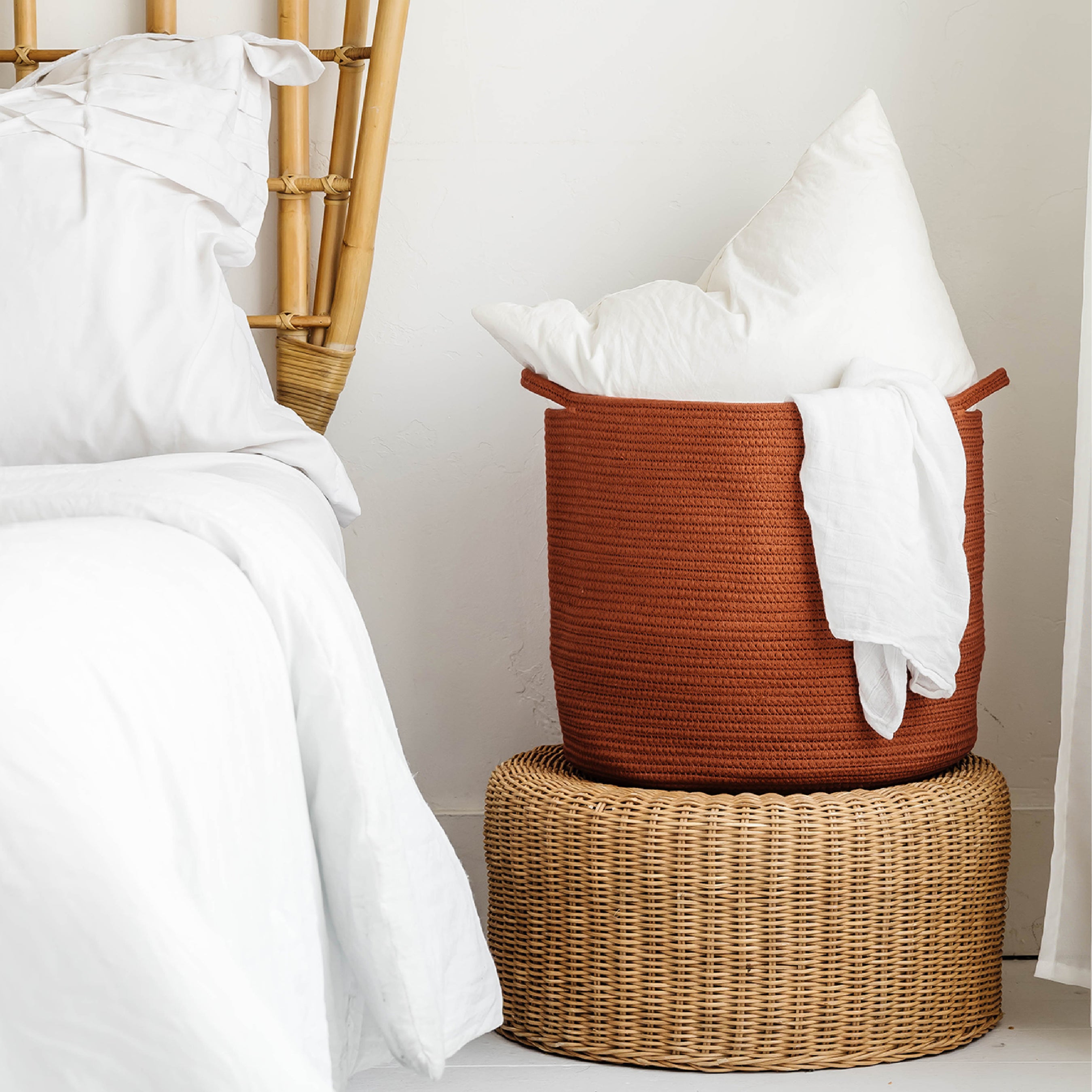 Natemia rope storage basket in bedroom corner