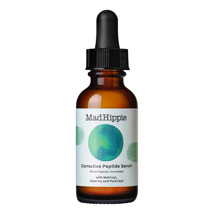 A brown glass dropper bottle of Mad Hippie Corrective Peptide Serum with a black cap and a white label featuring green watercolor circles and product details.