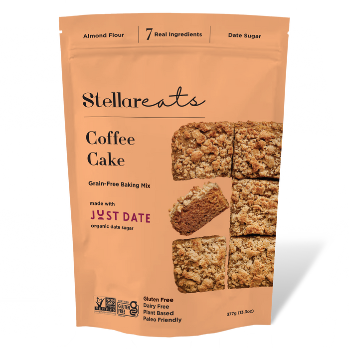 A peach-colored pouch of Stellareats Coffee Cake baking mix, featuring images of six pieces of crumb-topped coffee cake. The packaging highlights that it is gluten-free, dairy-free, plant-based, and paleo-friendly.