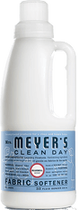 A white bottle of Mrs. Meyer’s Clean Day fabric softener with a blue label featuring product details and a red circle indicating bluebell scent. The bottle contains 32 fluid ounces for 32 loads.