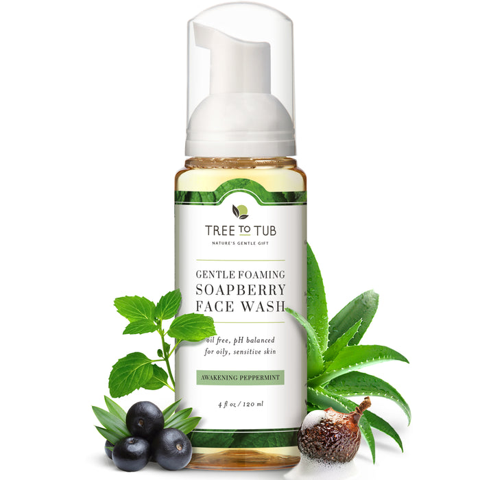 A bottle of Tree To Tub Gentle Foaming Soapberry Face Wash with a pump top is shown. The label highlights it is oil-free, pH balanced, for oily and sensitive skin, with peppermint, surrounded by soapberries, mint, and aloe leaves.