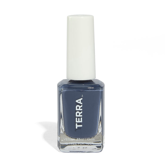 A bottle of TERRA nail polish with a dark blue shade, labeled VEGAN, in a clear rectangular glass container with a white cap, standing upright on a white background.