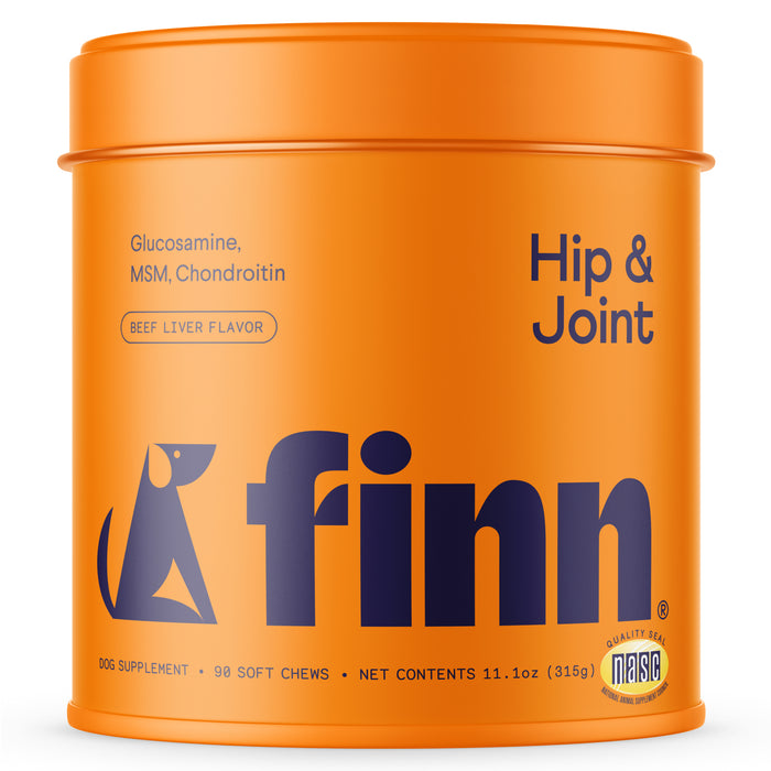Bright orange container labeled Finn Hip & Joint dog supplement with glucosamine, MSM, and chondroitin, beef liver flavor. The container features a dog graphic and holds 90 soft chews.