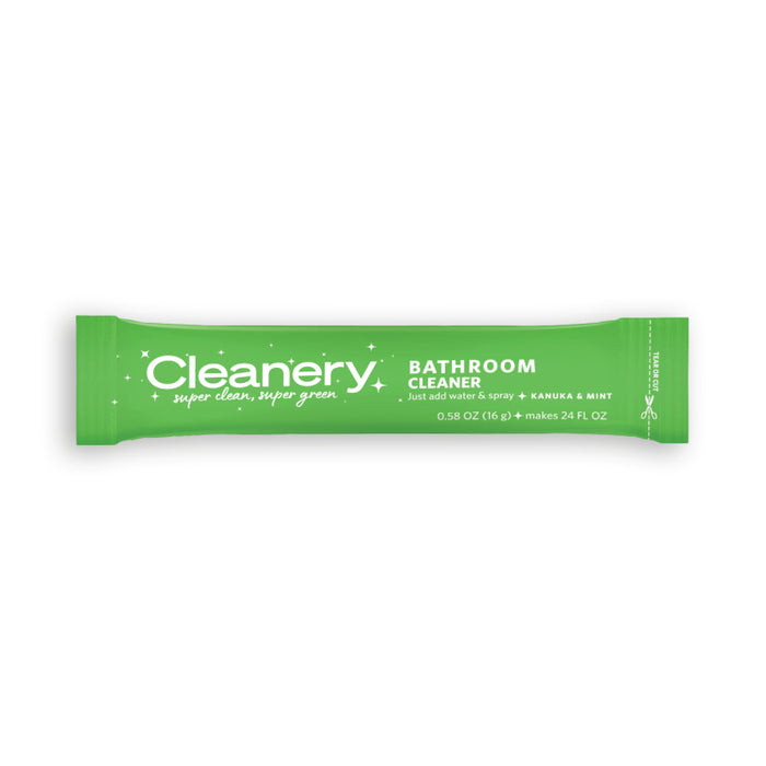 A green packet labeled Cleanery Bathroom Cleaner with text indicating it is a Kanuka & Mint scented cleaner that makes 24 fl oz when mixed with water. The packet is 0.58 oz (16g) and features a clean, eco-friendly design.