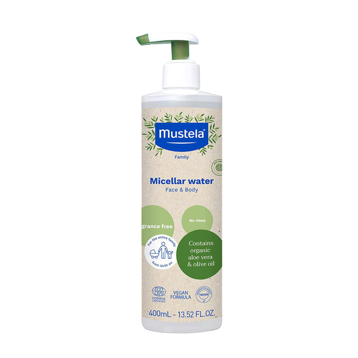 A 400mL bottle of Mustela Micellar Water for face and body, with a green pump top. The label highlights fragrance-free, no-rinse, vegan formula, and contains organic aloe vera and olive oil.