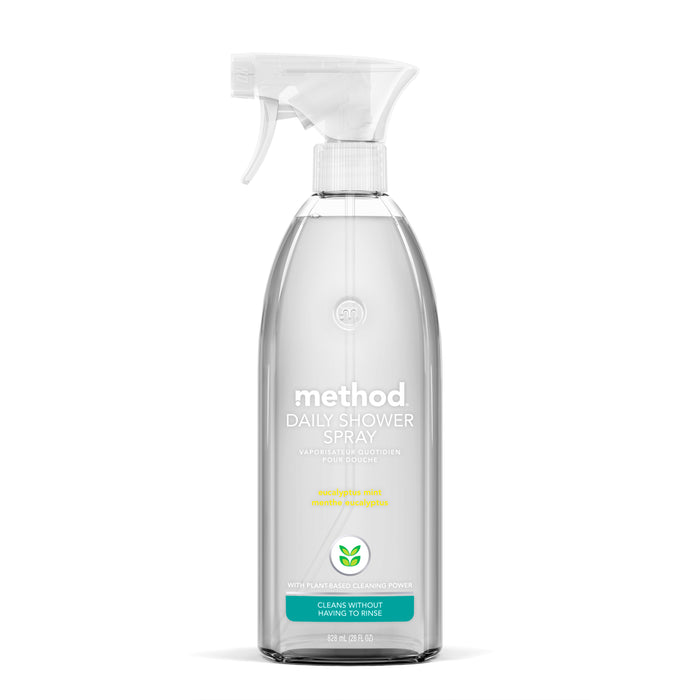 A clear spray bottle of Method Daily Shower Spray with a white label, white spray nozzle, and green accents. The label highlights plant-based cleaning power and states Cleans without having to rinse.