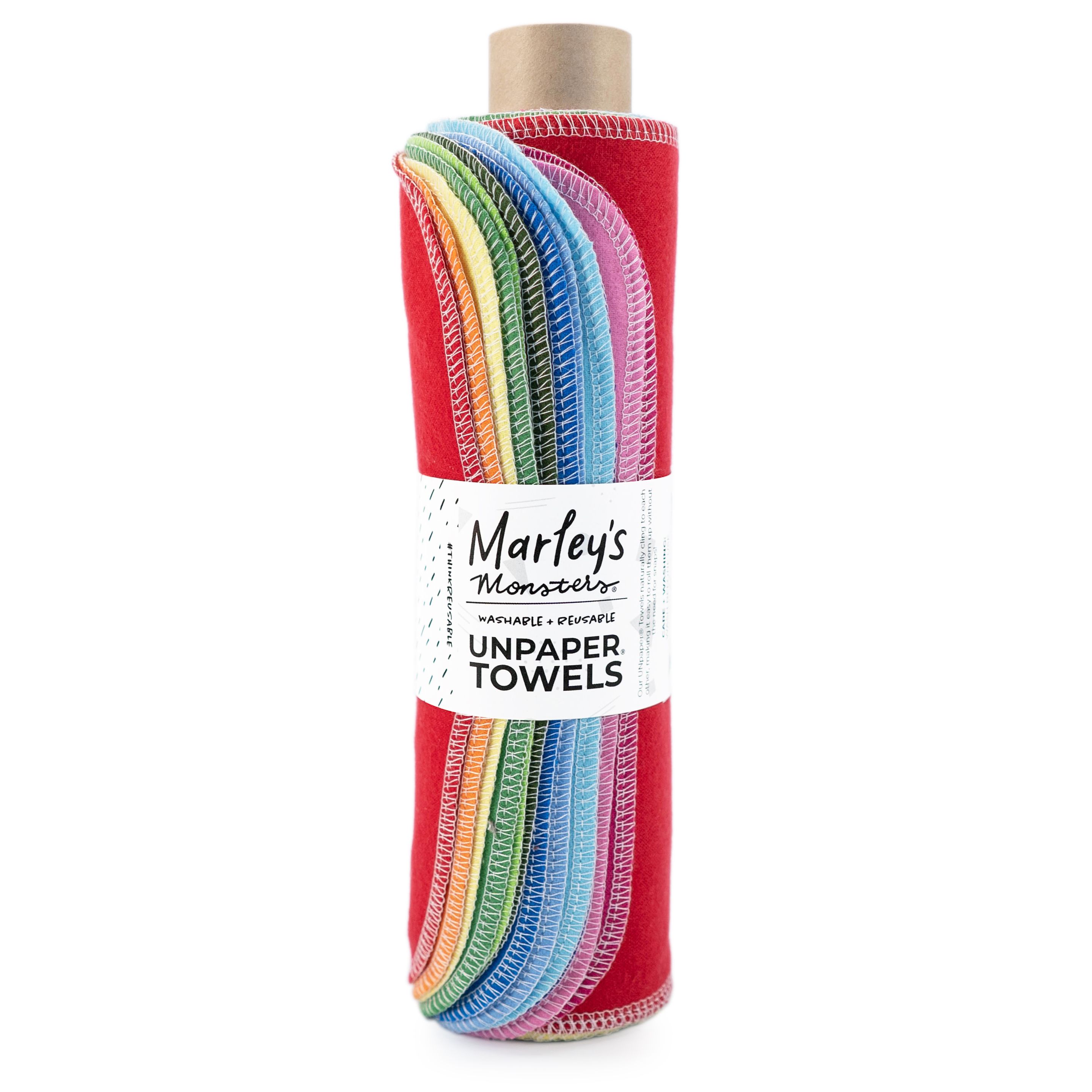 A roll of vibrant Rainbow Rolled Unpaper® Towels by Marleys Monsters features layers in red, green, yellow, blue, and purple. This eco-friendly and reusable product is neatly folded around a cardboard core.