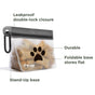 The (re)zip Airtight Pet Treat Bag + Carabiner features a clear, durable design with black paw print, leakproof double-lock closure, foldable flat or stand-up base, and a black clip—ideal as a leash accessory or poop bag holder.