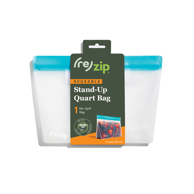 A clear BPA-free (re)zip Reusable Leakproof Quart Stand Up Bag with a blue zipper is shown in packaging labeled “REUSABLE Stand-Up Quart Bag, 1 No-Spill Bag” and features an image of berries inside the convenient stand-up bag.
