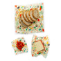 Bees Wrap Assorted 3 Pack Wraps - Holiday features small, medium, and large reusable wraps with festive prints to keep bread, tomatoes, and cheese fresh. Perfect for eco-friendly food storage on a white background.