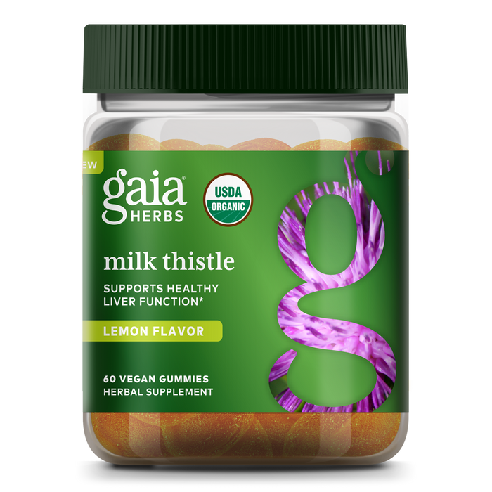 A jar of Gaia Herbs Milk Thistle vegan gummies, lemon flavor, with a green label featuring a large g over a purple thistle image. Label states Supports Healthy Liver Function and USDA Organic.
