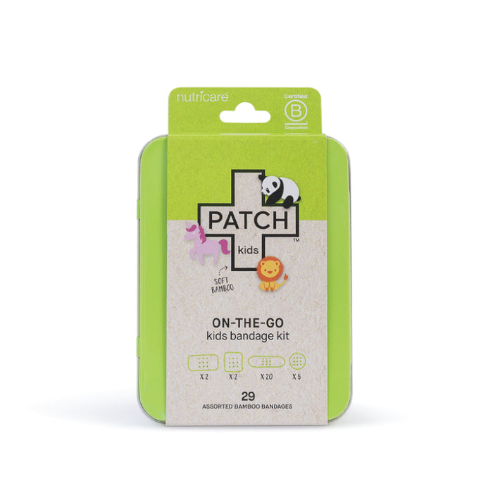 A green tin labeled PATCH kids ON-THE-GO kids bandage kit with cartoon images of a unicorn, lion, and panda. The kit contains 29 assorted bamboo bandages.