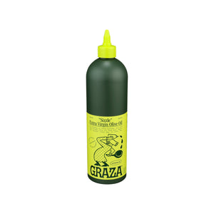 The green bottle of Grazas Sizzle Extra Virgin Olive Oil - For Cooking highlights a mellow flavor from mature olives and sports a bright yellow label featuring a cartoon chef pouring olive oil, with a pointed nozzle for easy dispensing.