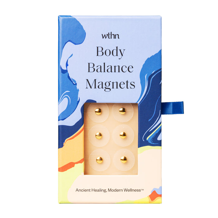 A box labeled “wthn Body Balance Magnets” with six small round magnets visible through a window. The packaging features a colorful abstract blue, orange, and yellow design with the text “Ancient Healing, Modern Wellness.”.