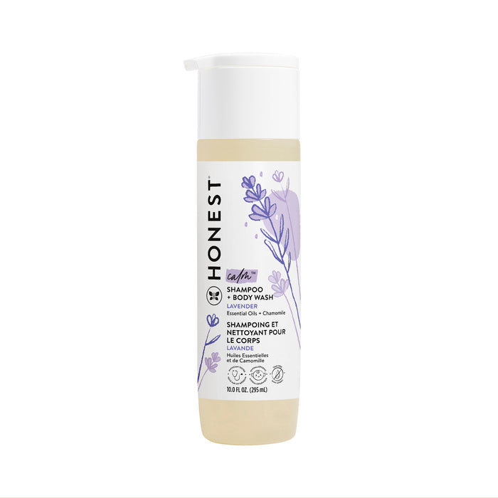 A bottle of Honest brand Calm Shampoo + Body Wash in Lavender scent, featuring a white label with purple floral illustrations and a pump dispenser, 10 fl oz (295 ml).