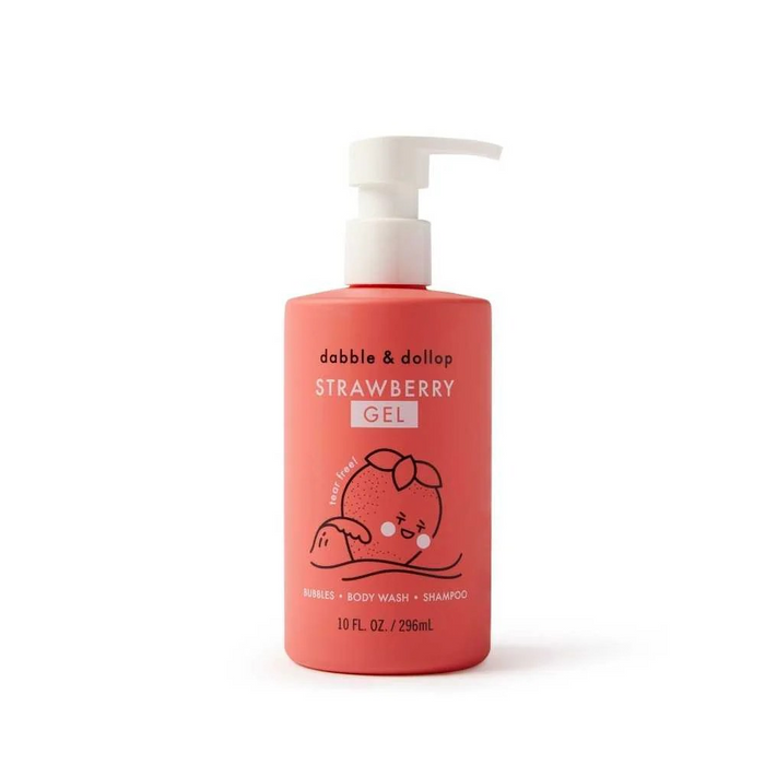 A pink bottle of Dabble & Dollop Strawberry Gel with a white pump dispenser, featuring a cute cartoon strawberry illustration and text indicating it is a bubbles, body wash, and shampoo product.