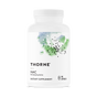 A white bottle of Thorne NAC - N-Acetylcysteine supplement for immune and liver health, containing 180 capsules. The minimalistic label features abstract green and blue watercolor art with black dots.