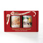 The Savannah Bee Company Cinnamon & Chocolate Whipped Duo gift box includes two jars—Cinnamon Honey and Chocolate Spread—with illustrated labels showcasing the honey and its tasty ingredients.