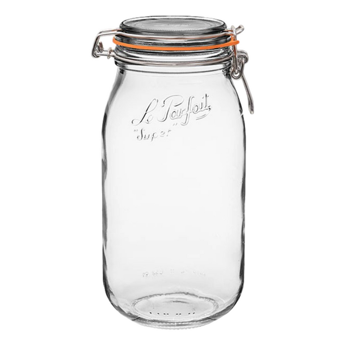 A clear glass jar with an orange rubber seal, metal clasp, and embossed text reading Le Parfait Super on the front. The jar is empty and has a wide mouth.