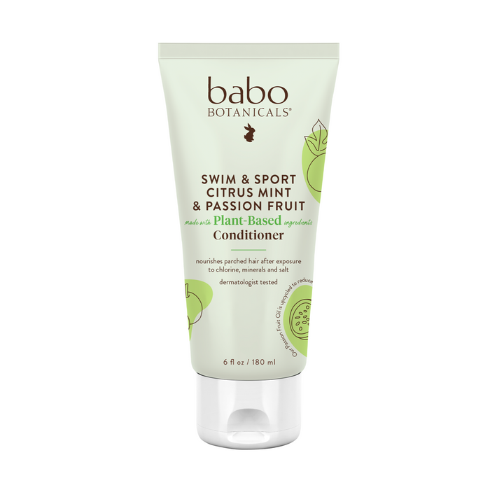 Front view of a 6 oz tube of Babo Botanicals Swim & Sport Citrus Mint & Passion Fruit Plant-Based Conditioner, featuring green accents and fruit illustrations on a light background.