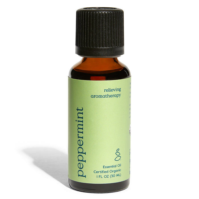 A small amber glass bottle with a black cap, labeled “peppermint essential oil, certified organic, relieving aromatherapy, 1 fl oz (30 mL), on a white background.