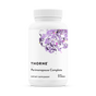 A white bottle of Thorne Perimenopause Complete Capsules features a purple floral label design and contains 60 capsules for perimenopause support and mood balance.