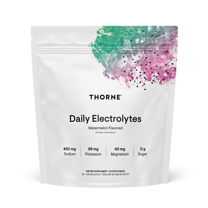 Thorne Daily Electrolytes comes in a white pouch with a green and pink watercolor design, highlighting its watermelon flavor. The label promotes key nutrients for hydration, electrolyte balance, and athletic performance—all with zero sugar.