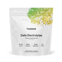 A white Thorne Daily Electrolytes pouch features a green and yellow splash at the top, showcasing mango limeade flavor and key electrolytes—sodium, potassium, magnesium—for cellular hydration plus sugar content on the front.