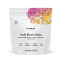 A white Thorne Daily Electrolytes pouch features a colorful abstract top design. The label highlights Blood Orange, Mango Limeade, and Watermelon flavors plus sodium, potassium, magnesium for hydration—all with 0g sugar.