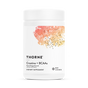 A white container of Thorne Creatine + BCAAs, peach mango flavored, features a colorful abstract label with black text highlighting its support for strength and endurance.