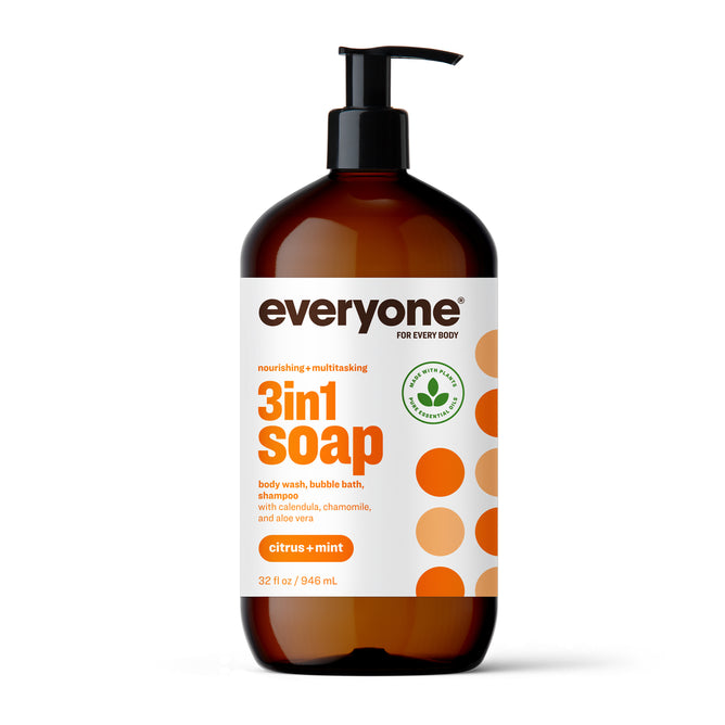 A brown pump bottle labeled “Everyone 3in1 Soap” with citrus + mint scent, for use as body wash, bubble bath, and shampoo. The white label has orange and beige accents and highlights natural ingredients.